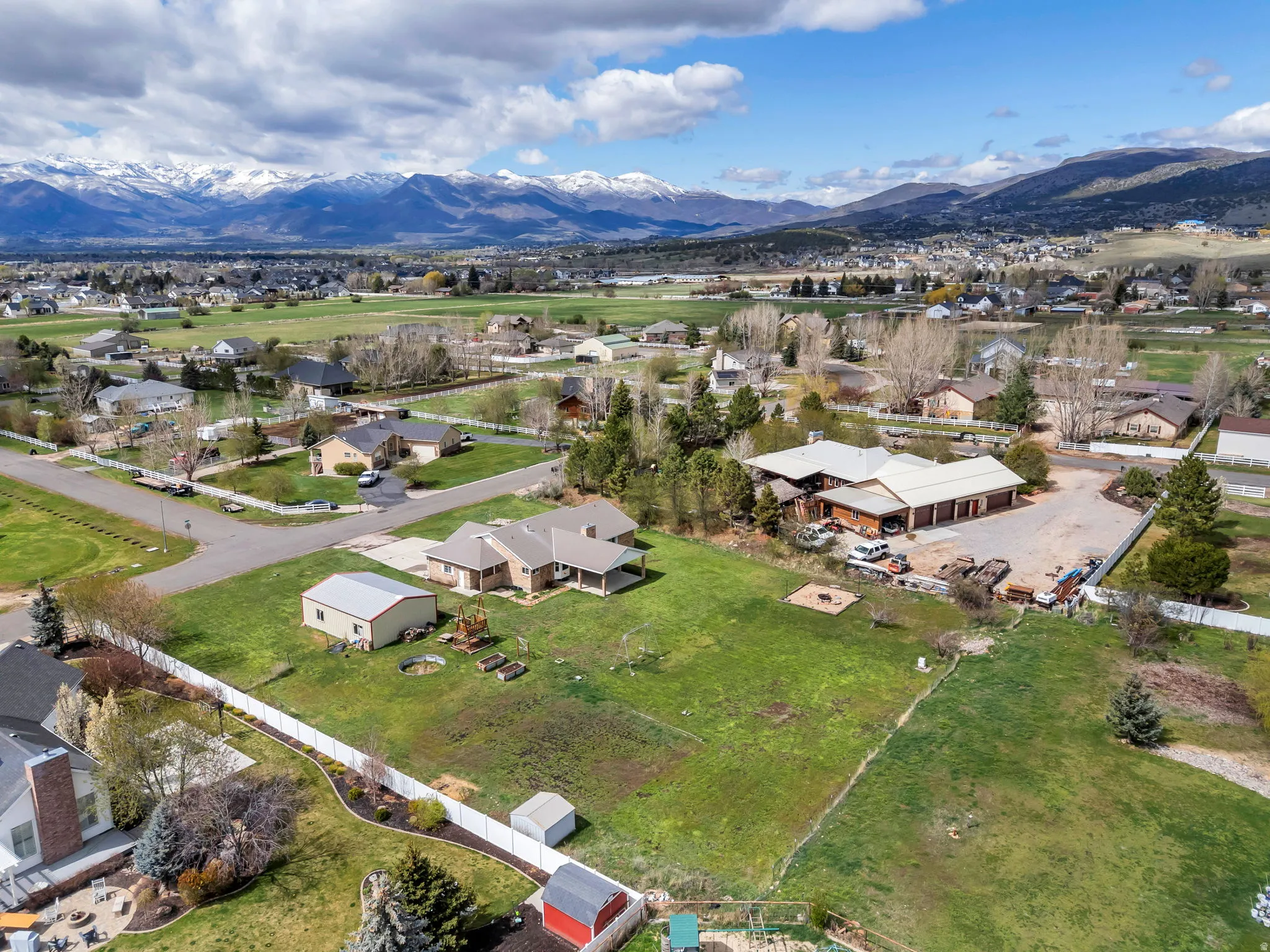 Aerial perspective of suburban area featuring a mountainous background