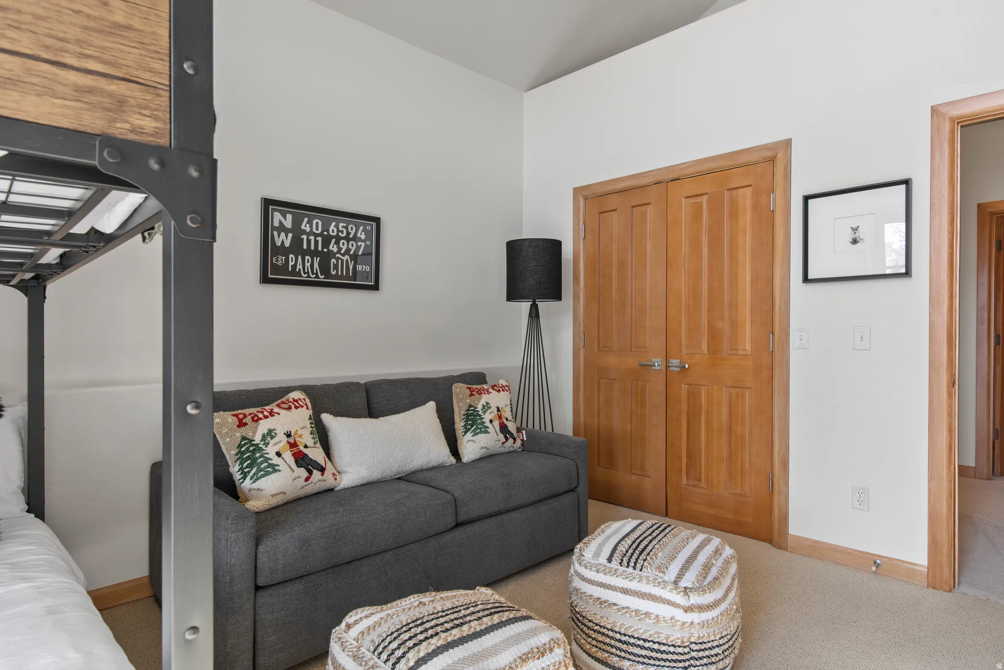 Carpeted living room with baseboards