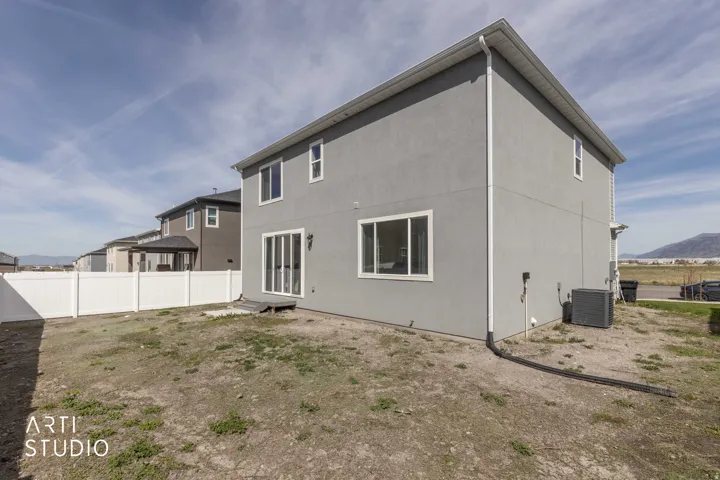 Back of house featuring a mountain view