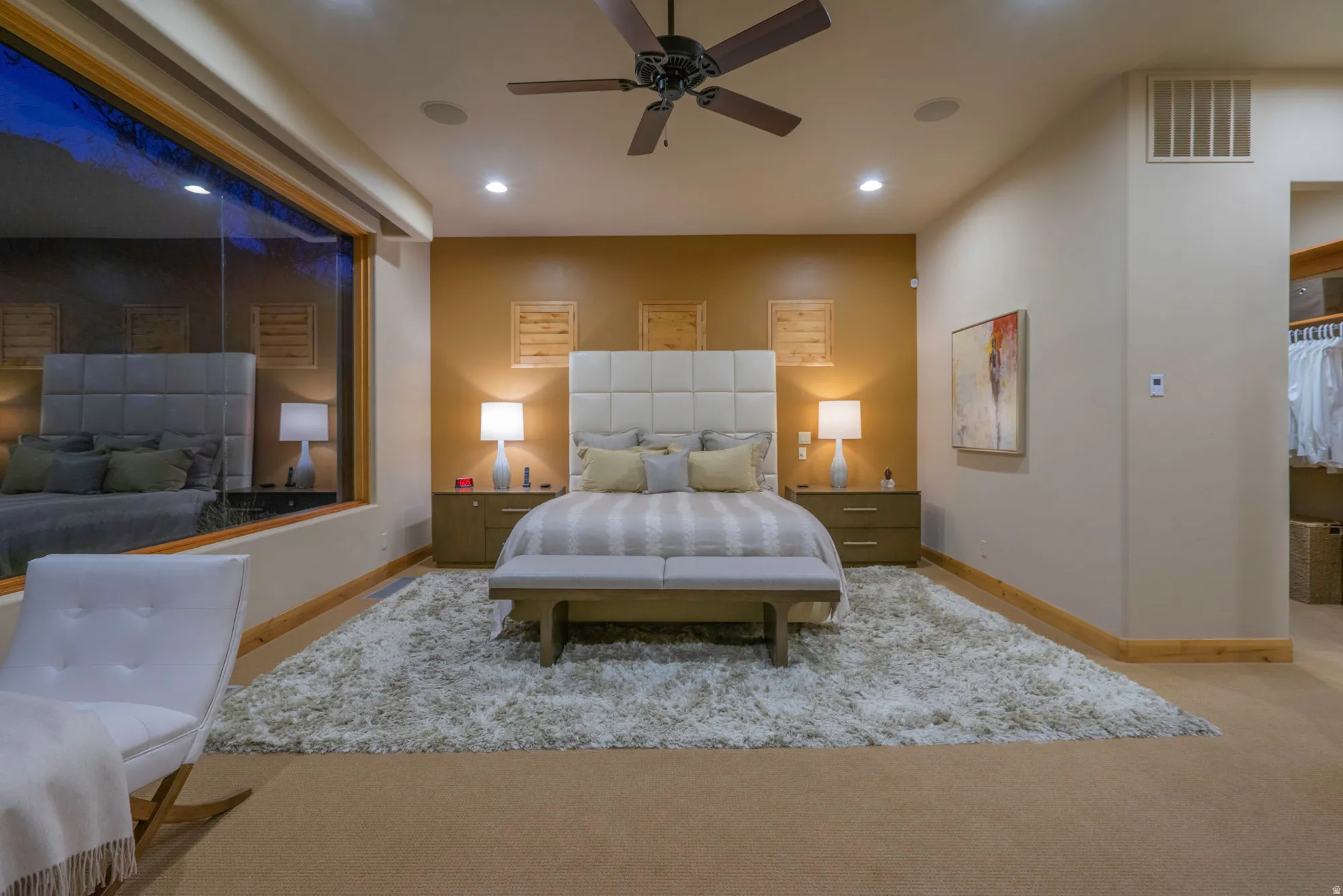 Bedroom featuring light colored carpet, recessed lighting, and a ceiling fan