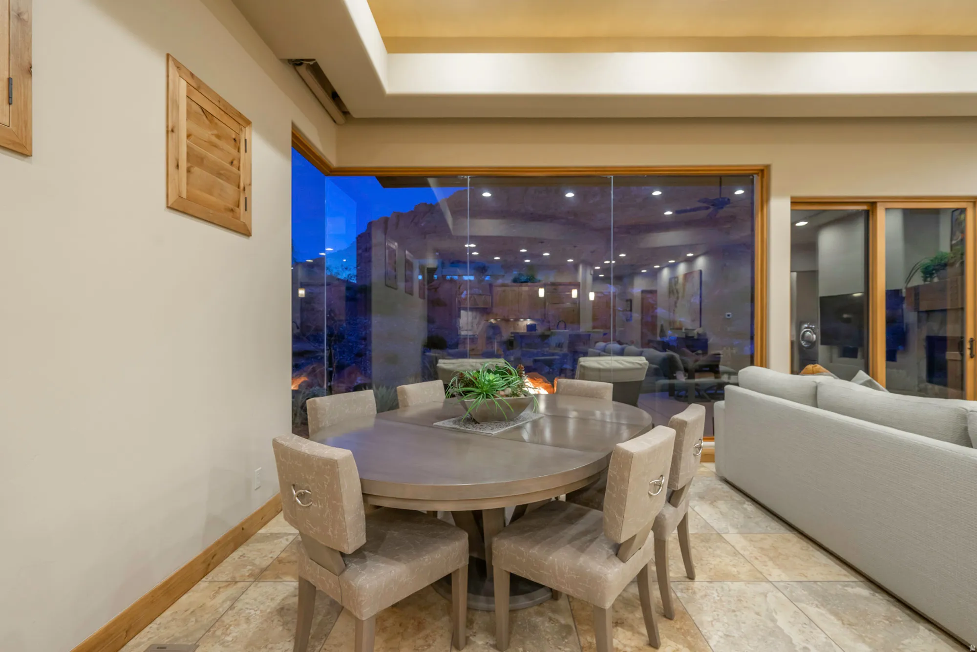 Dining space featuring stone tile flooring