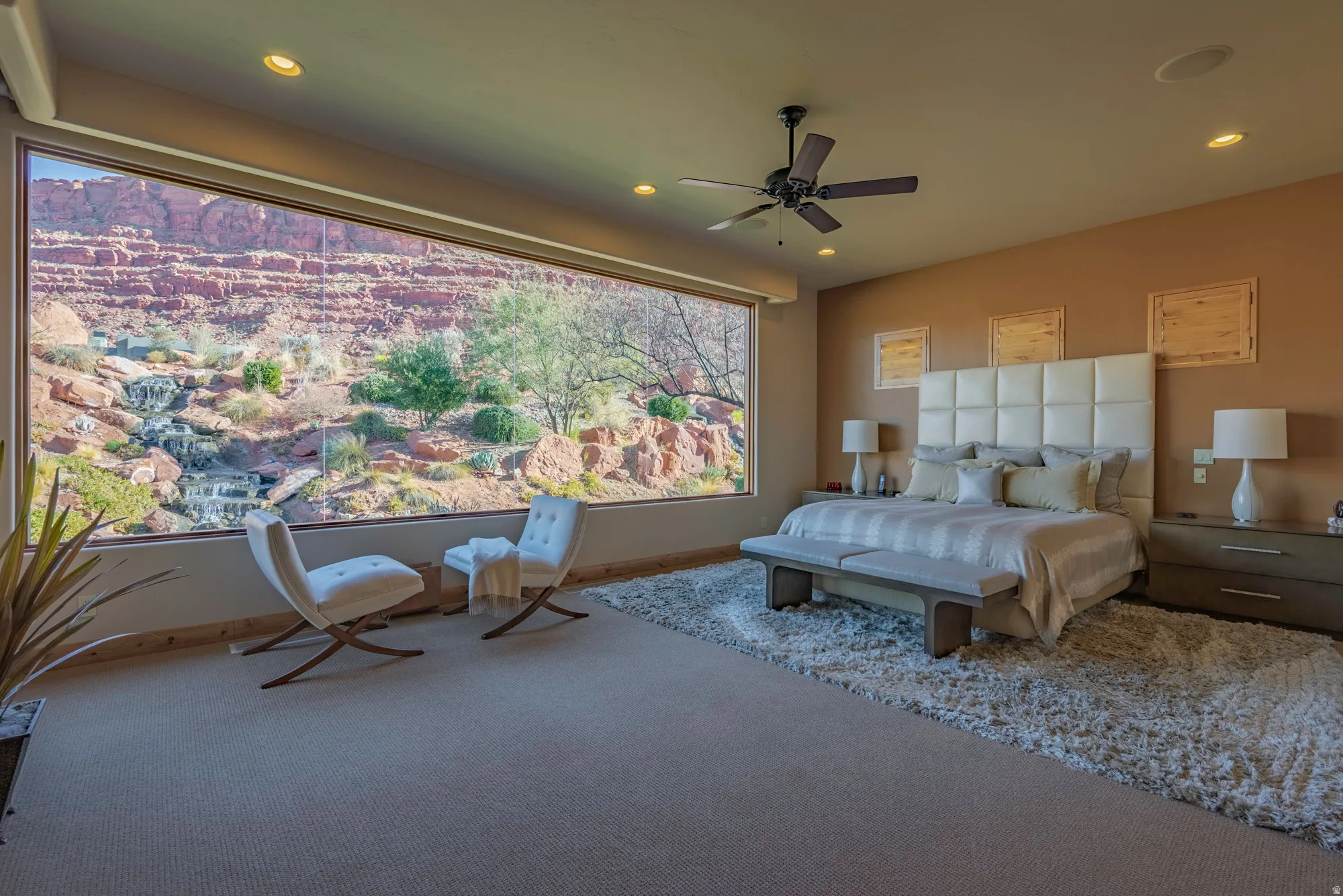 Bedroom with carpet flooring, ceiling fan, and recessed lighting