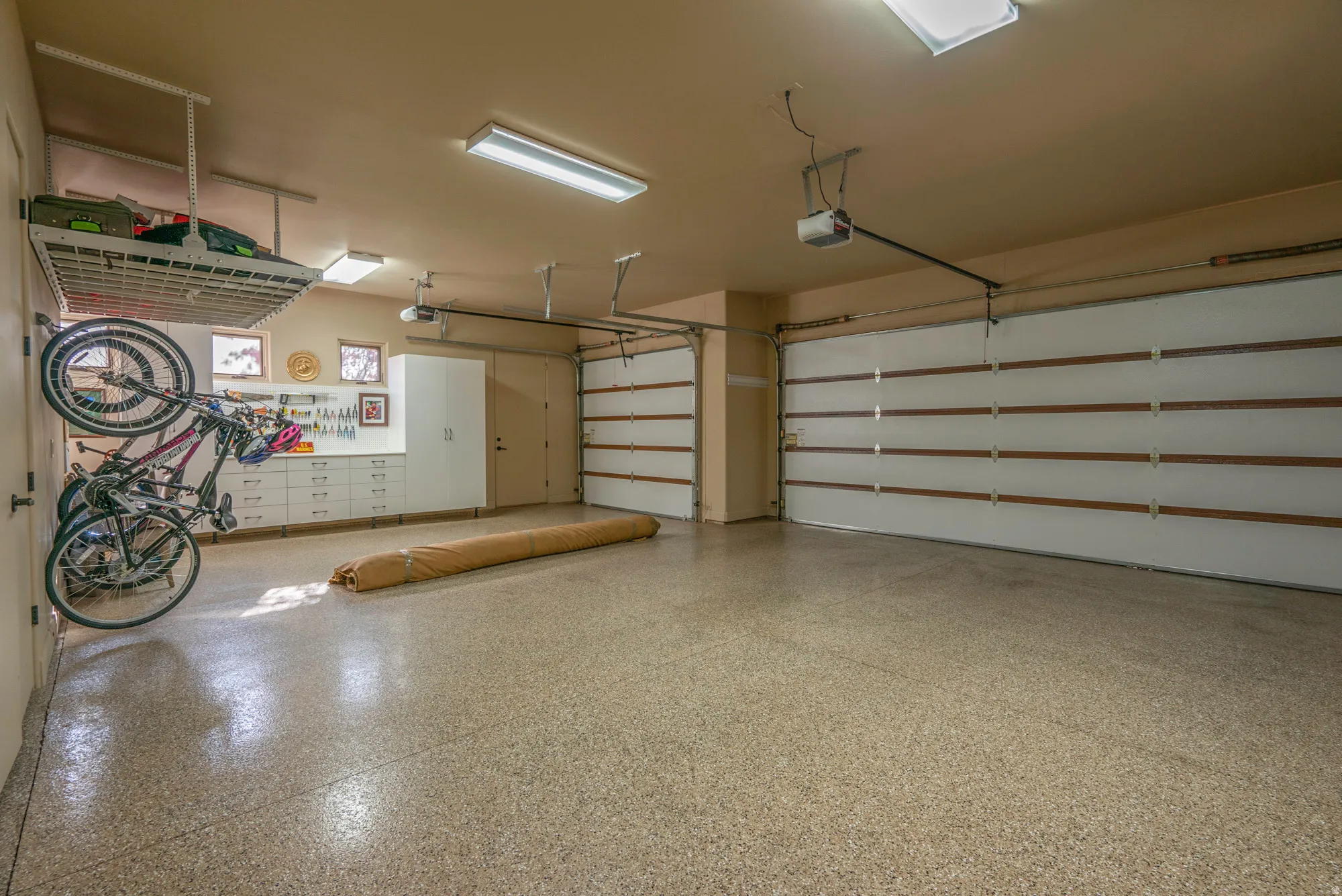 Garage featuring a garage door opener