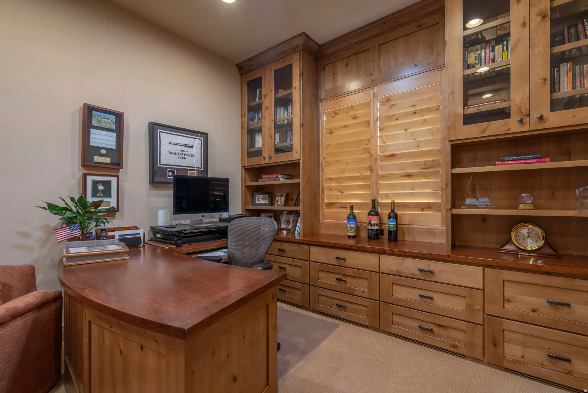 Home office featuring light carpet