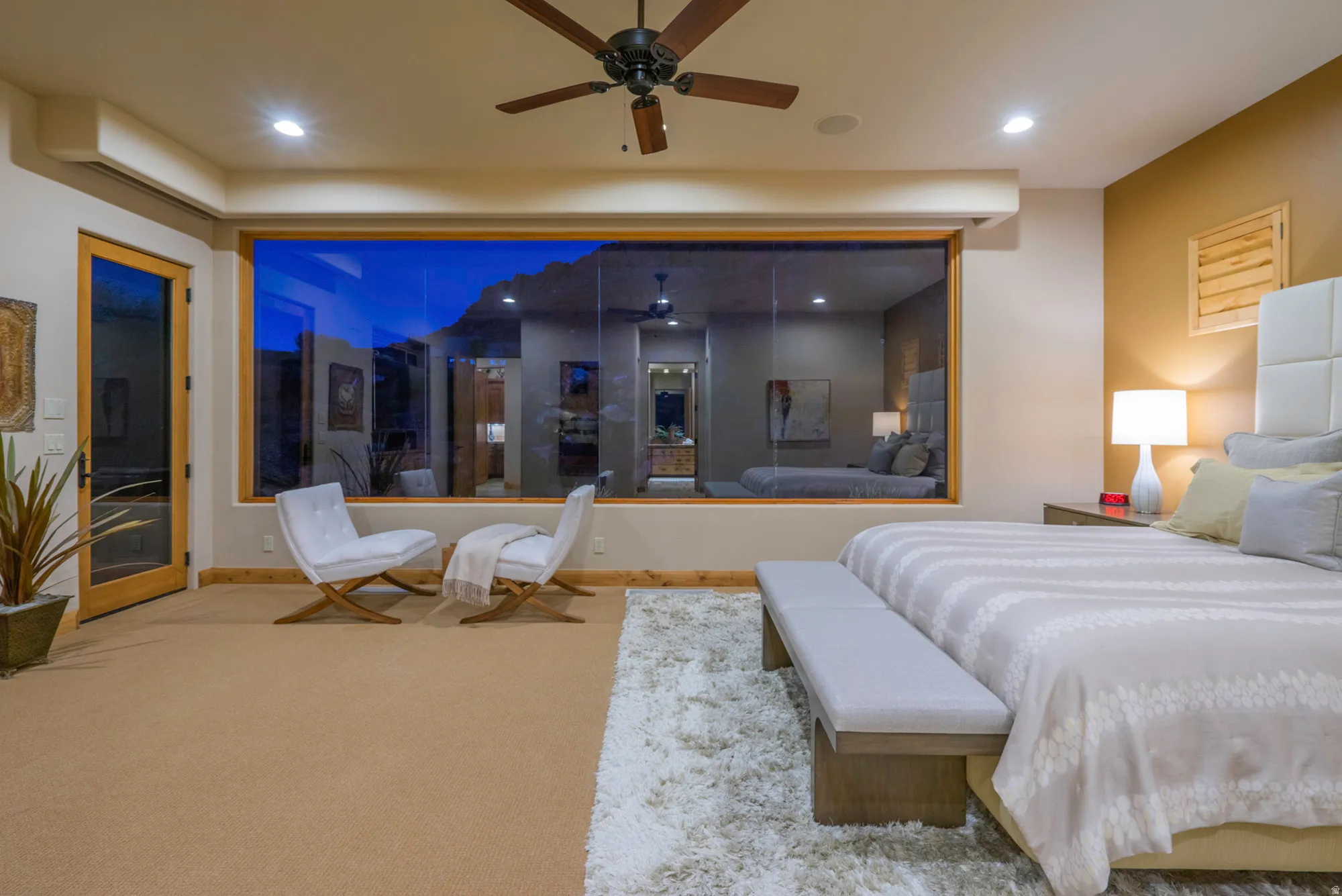 Bedroom featuring carpet floors, ceiling fan, and recessed lighting