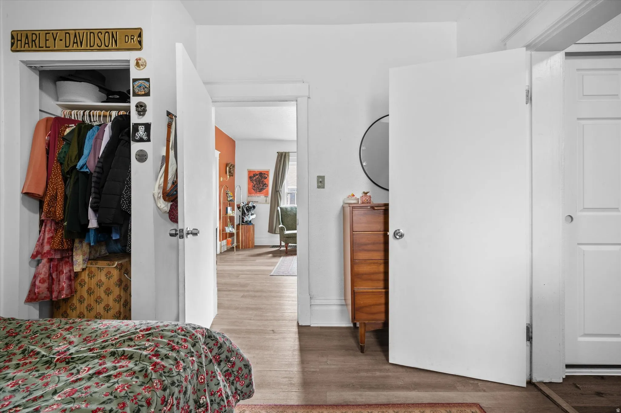 Bedroom featuring a closet and light wood finished floors