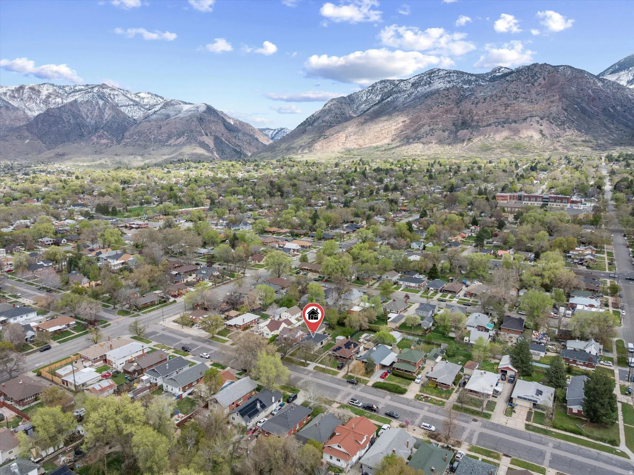 Aerial view of residential area with mountains