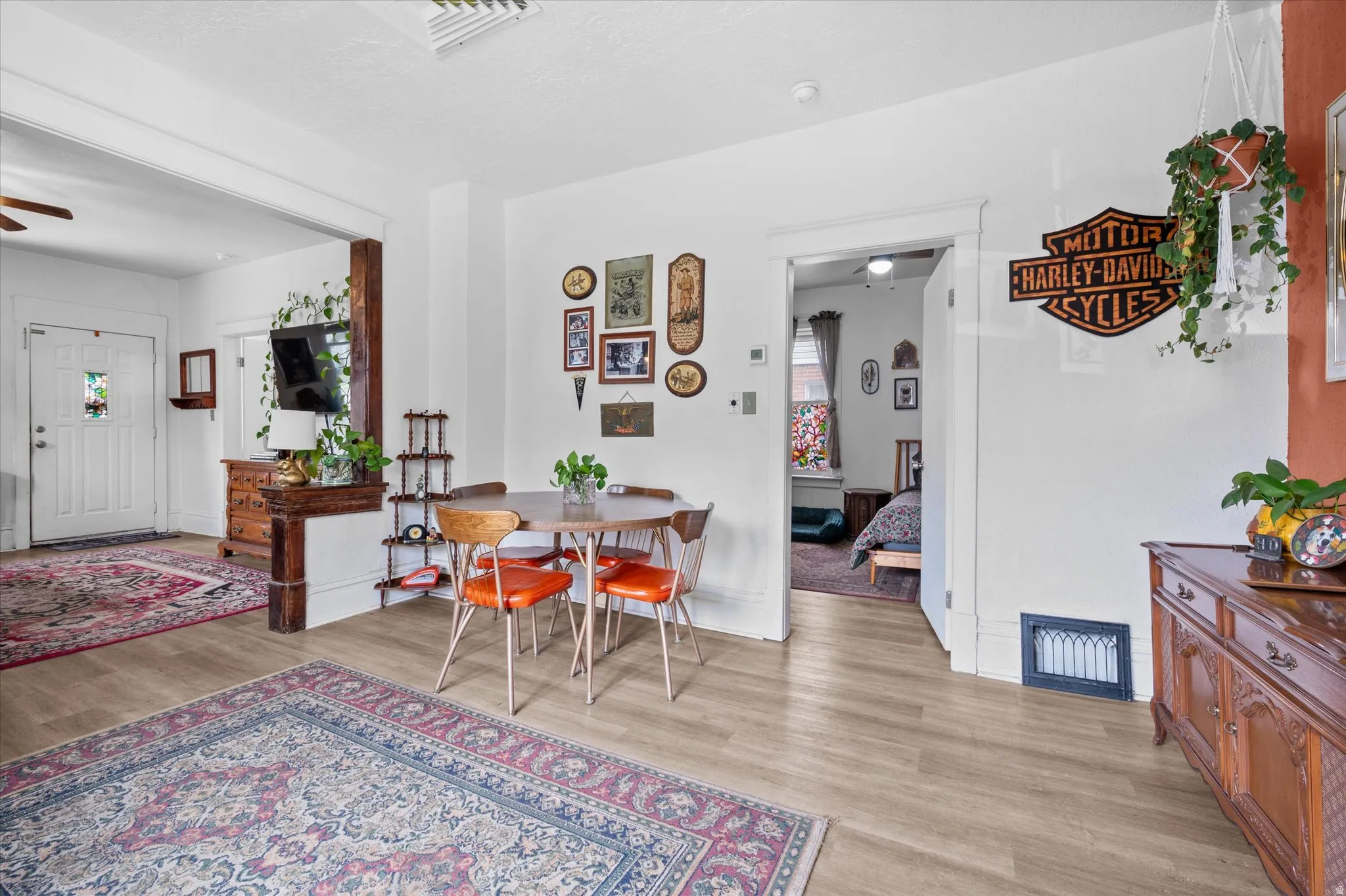 Dining room featuring light wood-style floors and a ceiling fan