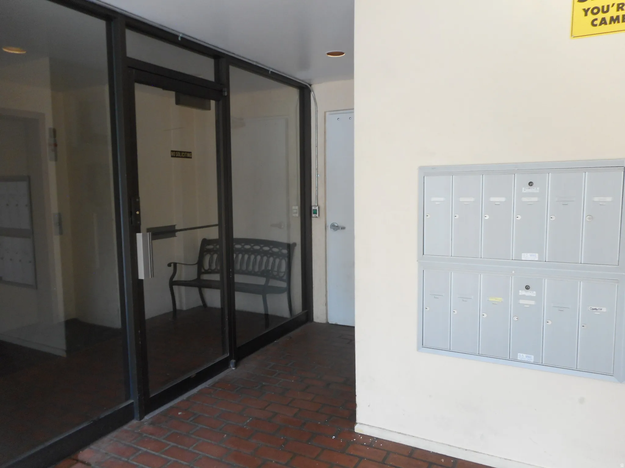 Property entrance featuring stucco siding