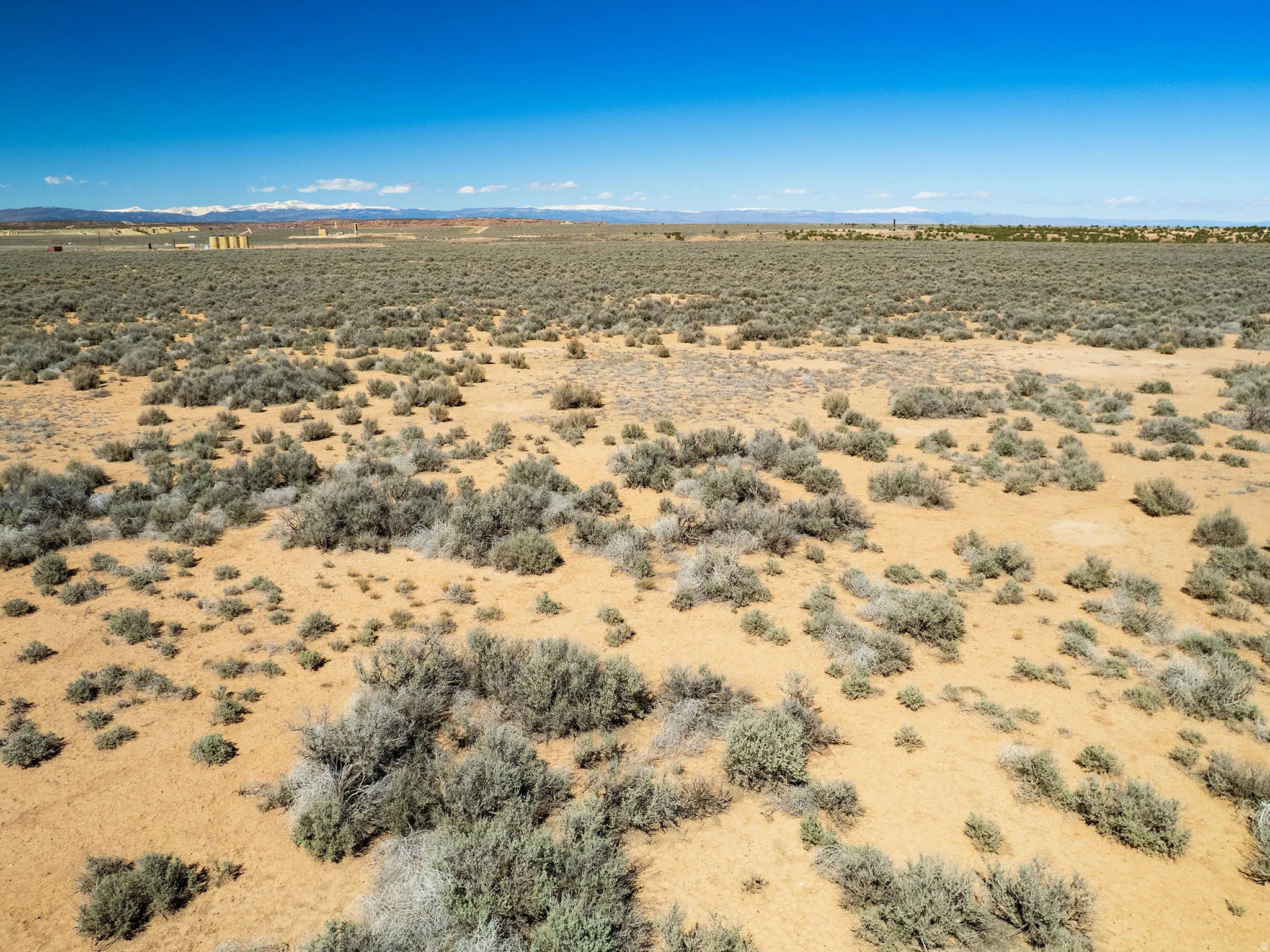 View of mountain backdrop featuring a desert landscape and rural landscape