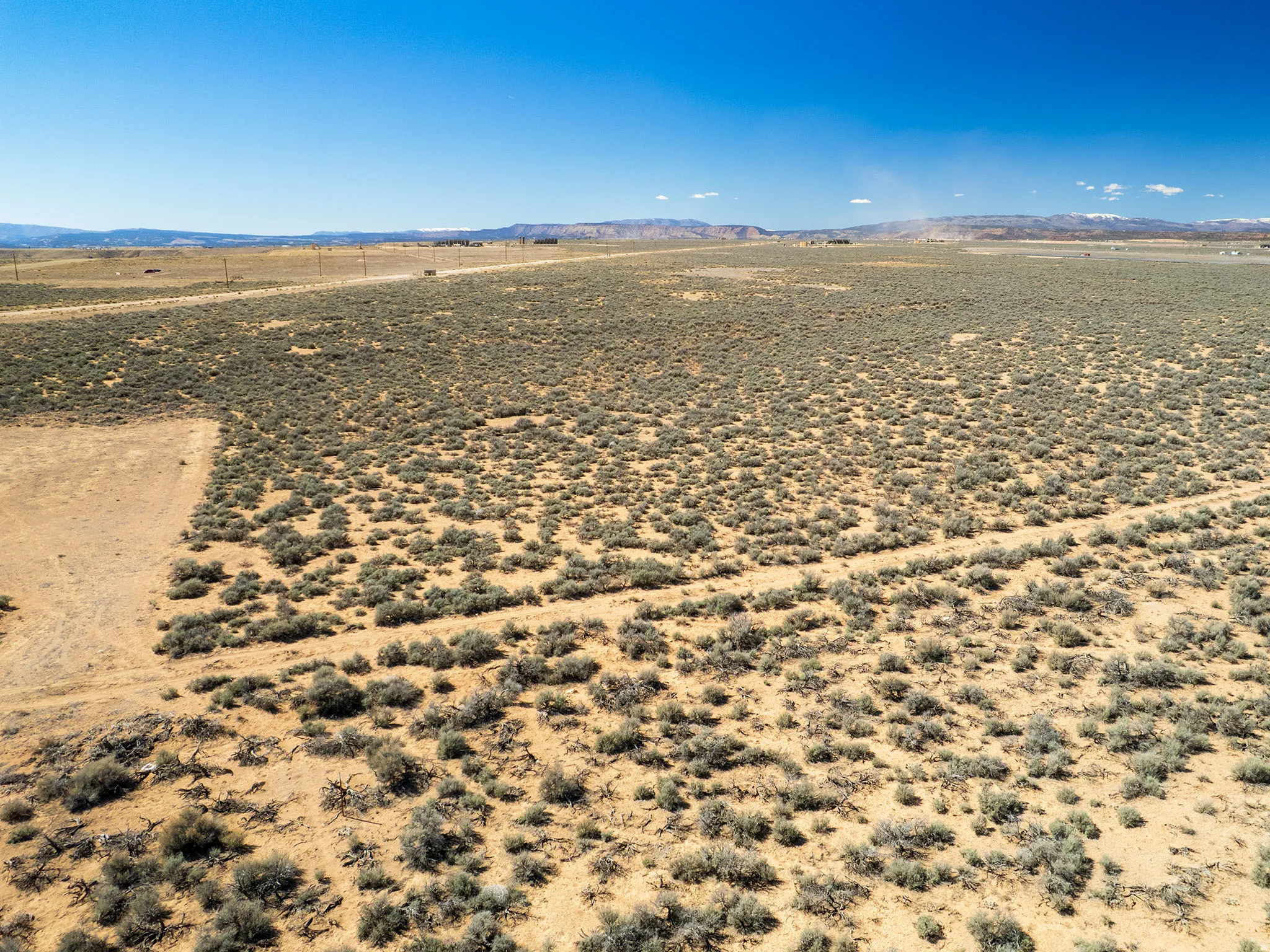 View of rural area with mountains and a desert landscape