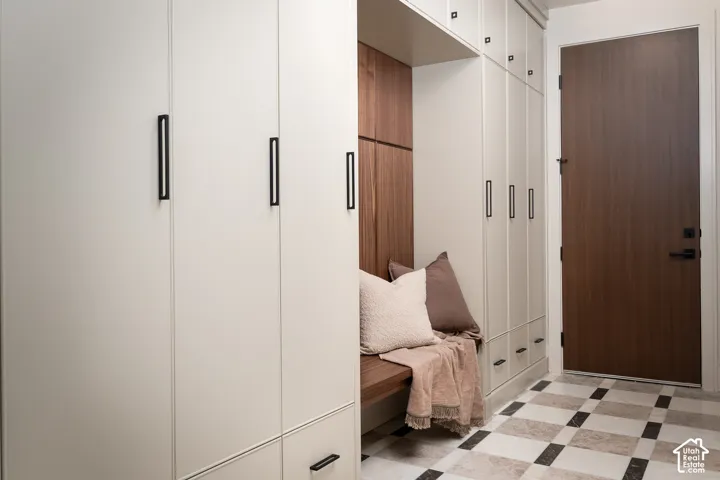 Mudroom featuring light flooring