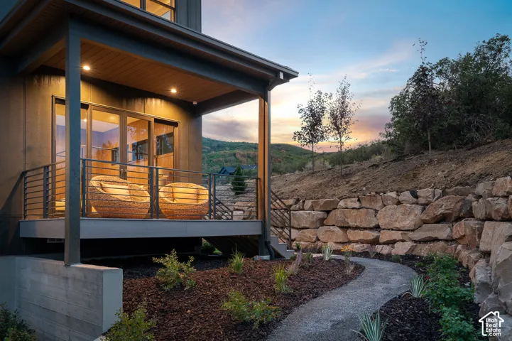View of property exterior at dusk