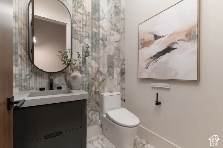 Bathroom with toilet and vanity