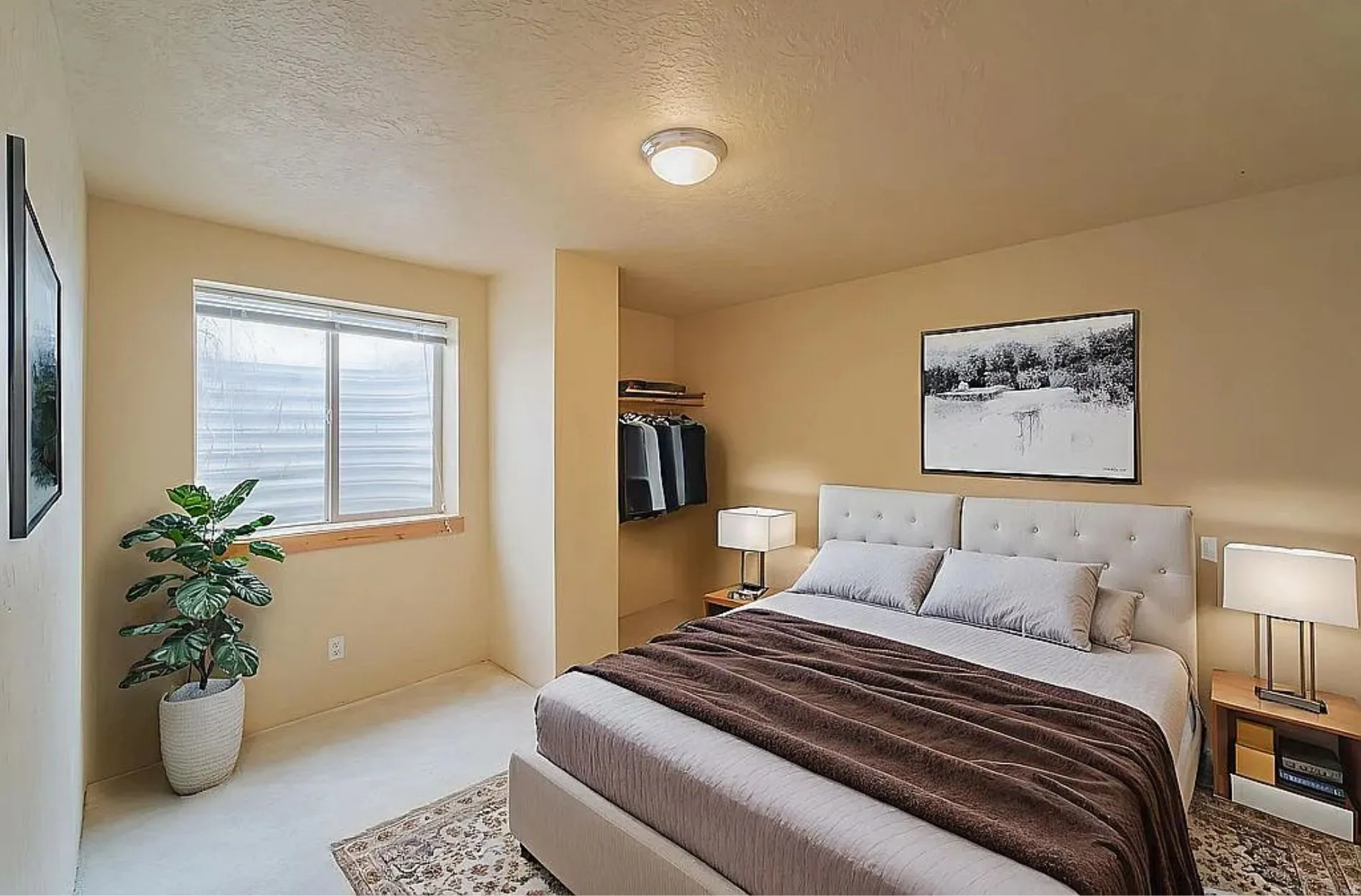 Bedroom featuring a textured ceiling