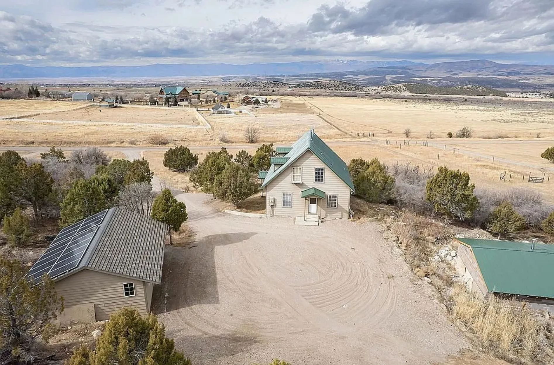 Aerial view of sparsely populated area with mountains