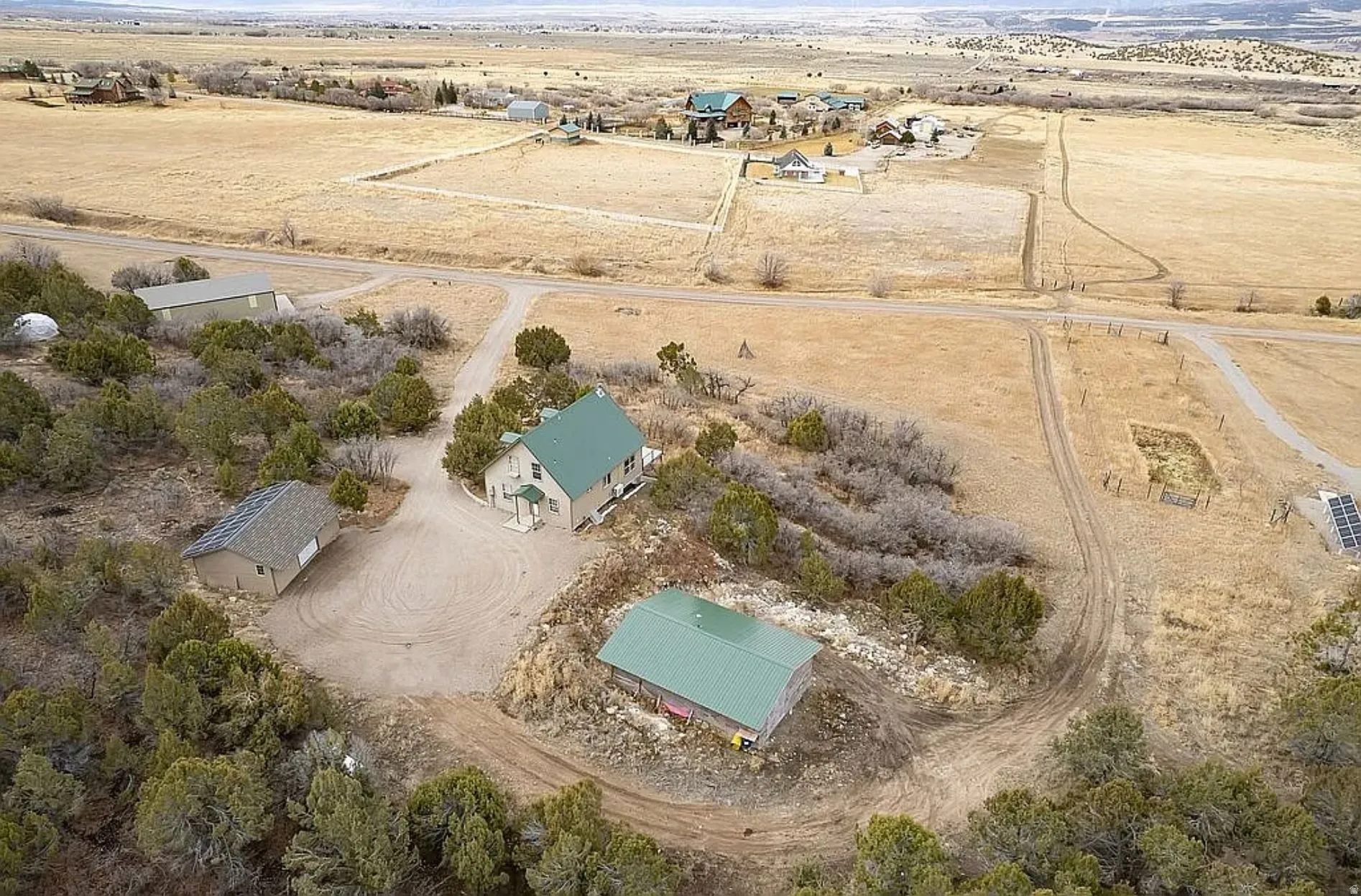 Aerial view of property's location featuring rural landscape and a desert landscape
