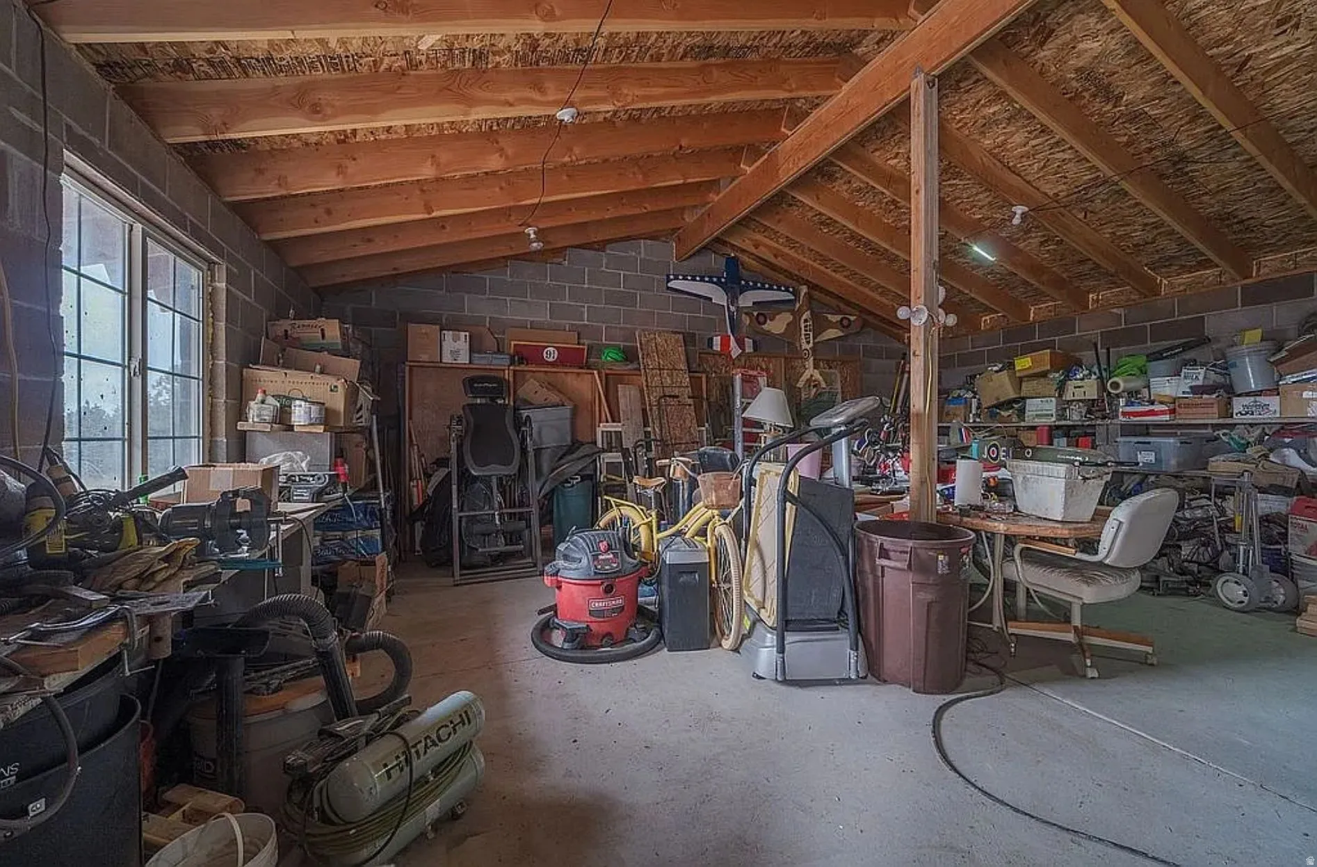 Miscellaneous room with concrete floors
