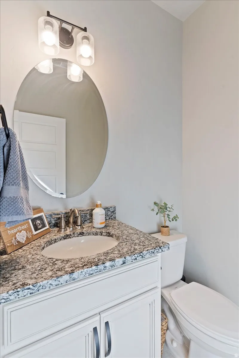 Bathroom with vanity and toilet
