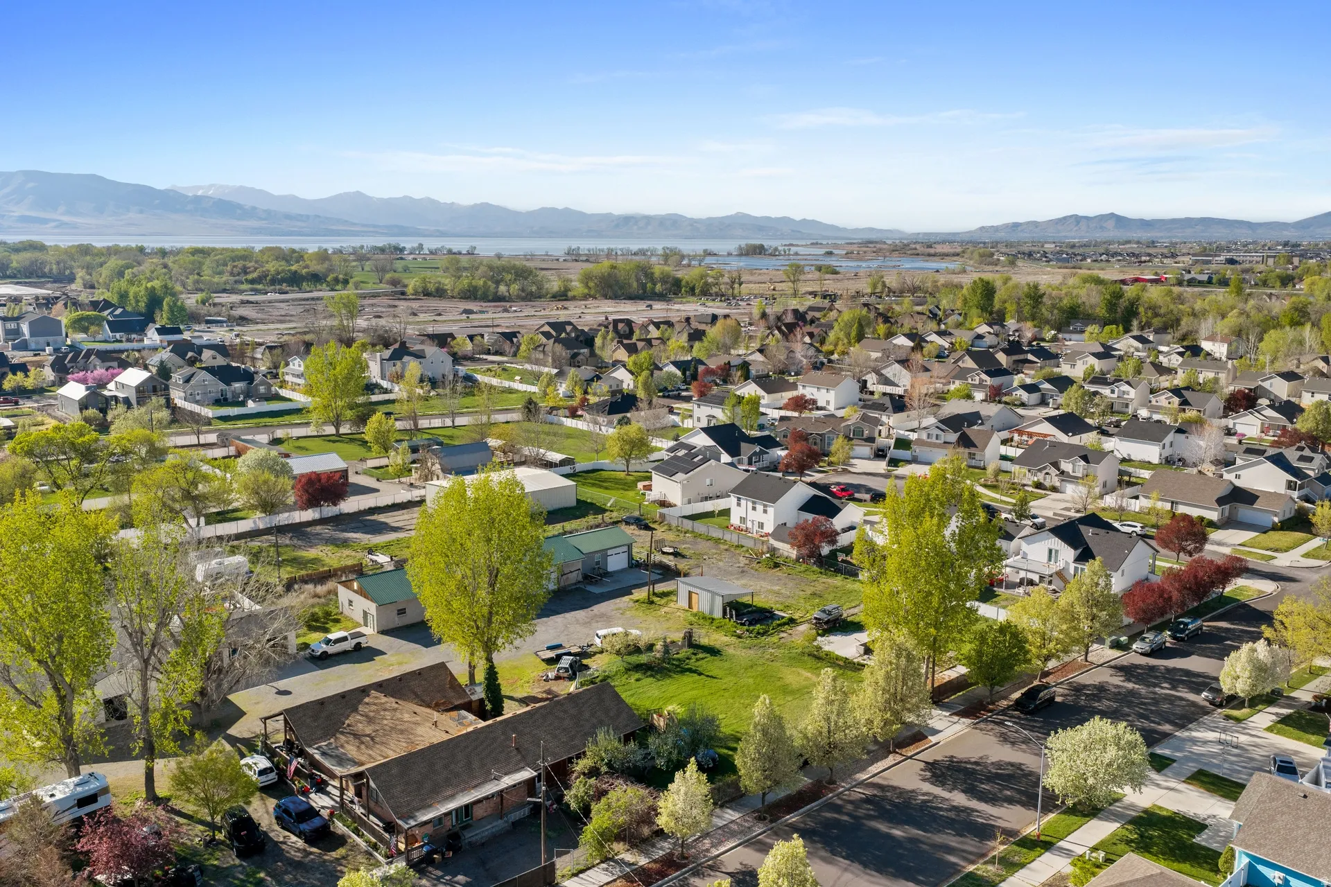 Aerial view of residential area with a mountainous background