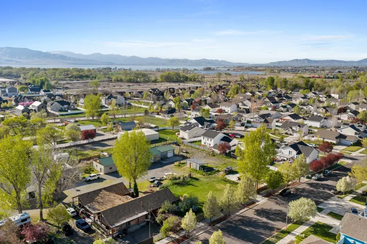 Aerial view of residential area with a mountainous background