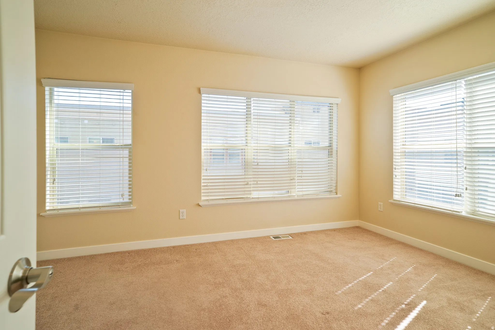 Main bedroom with windows to the west and south