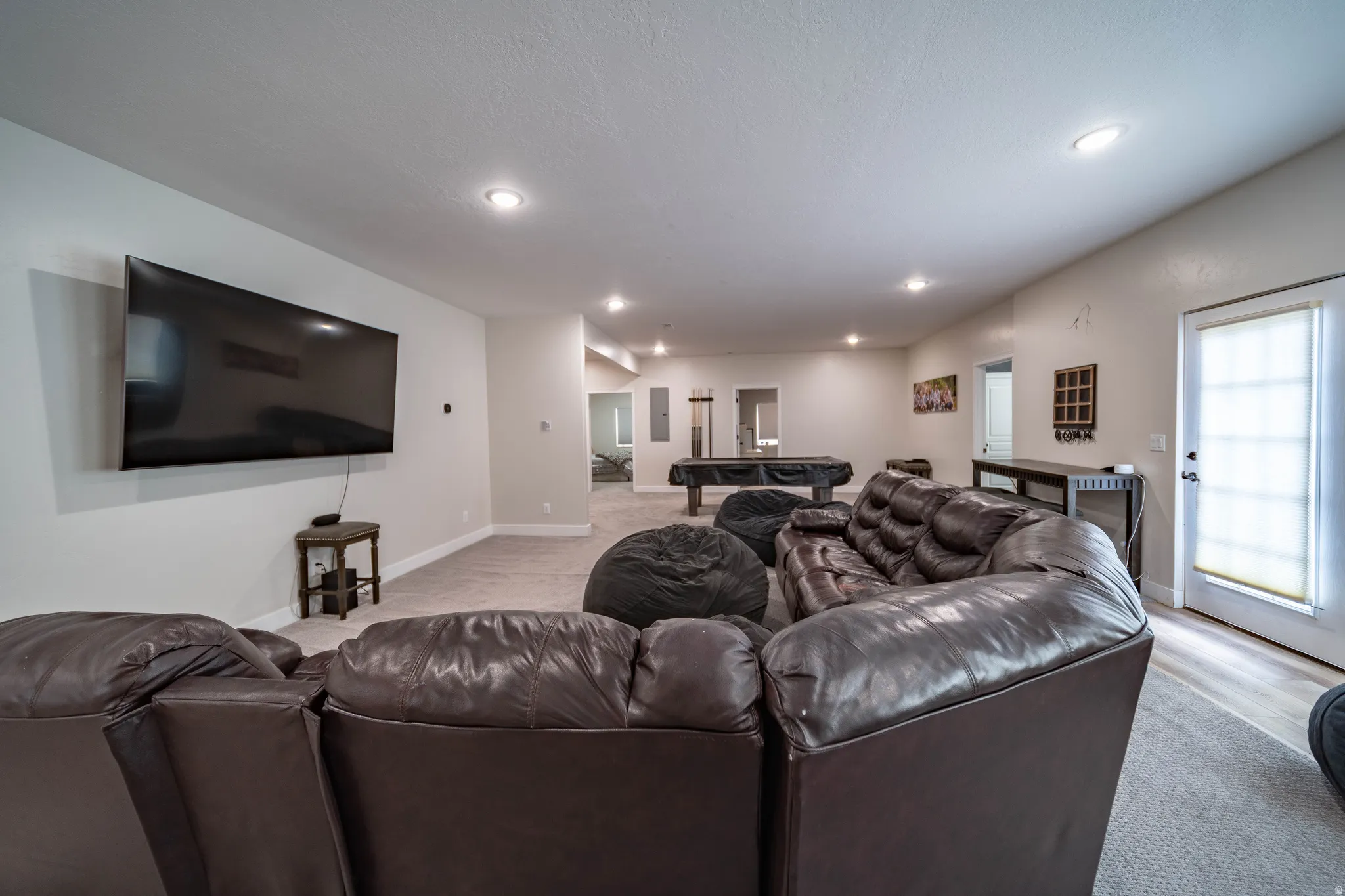 Living room featuring recessed lighting and pool table