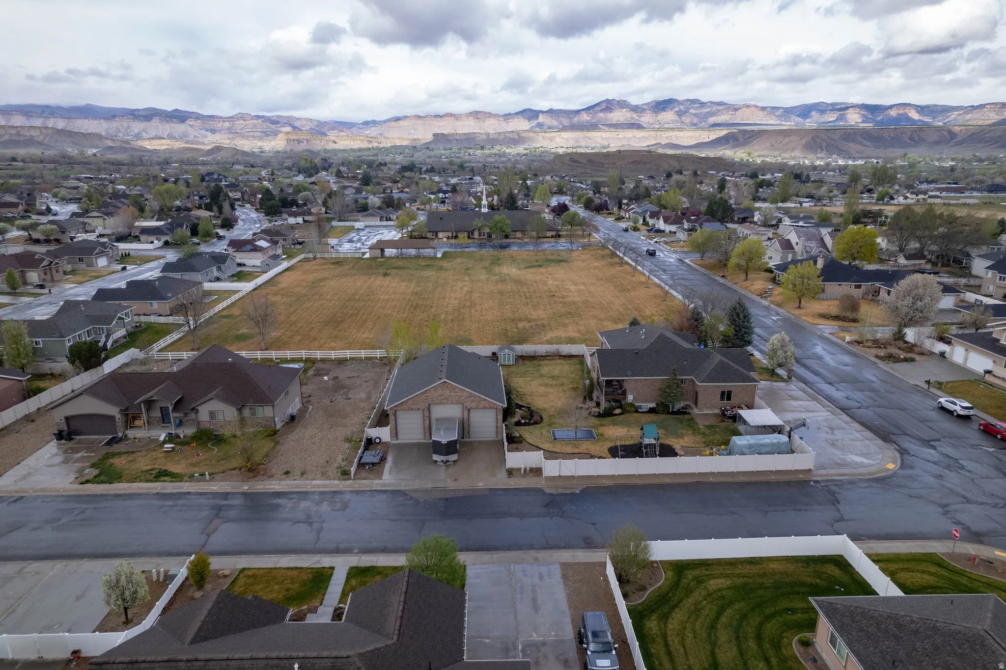 Aerial view of residential area with a mountain backdrop