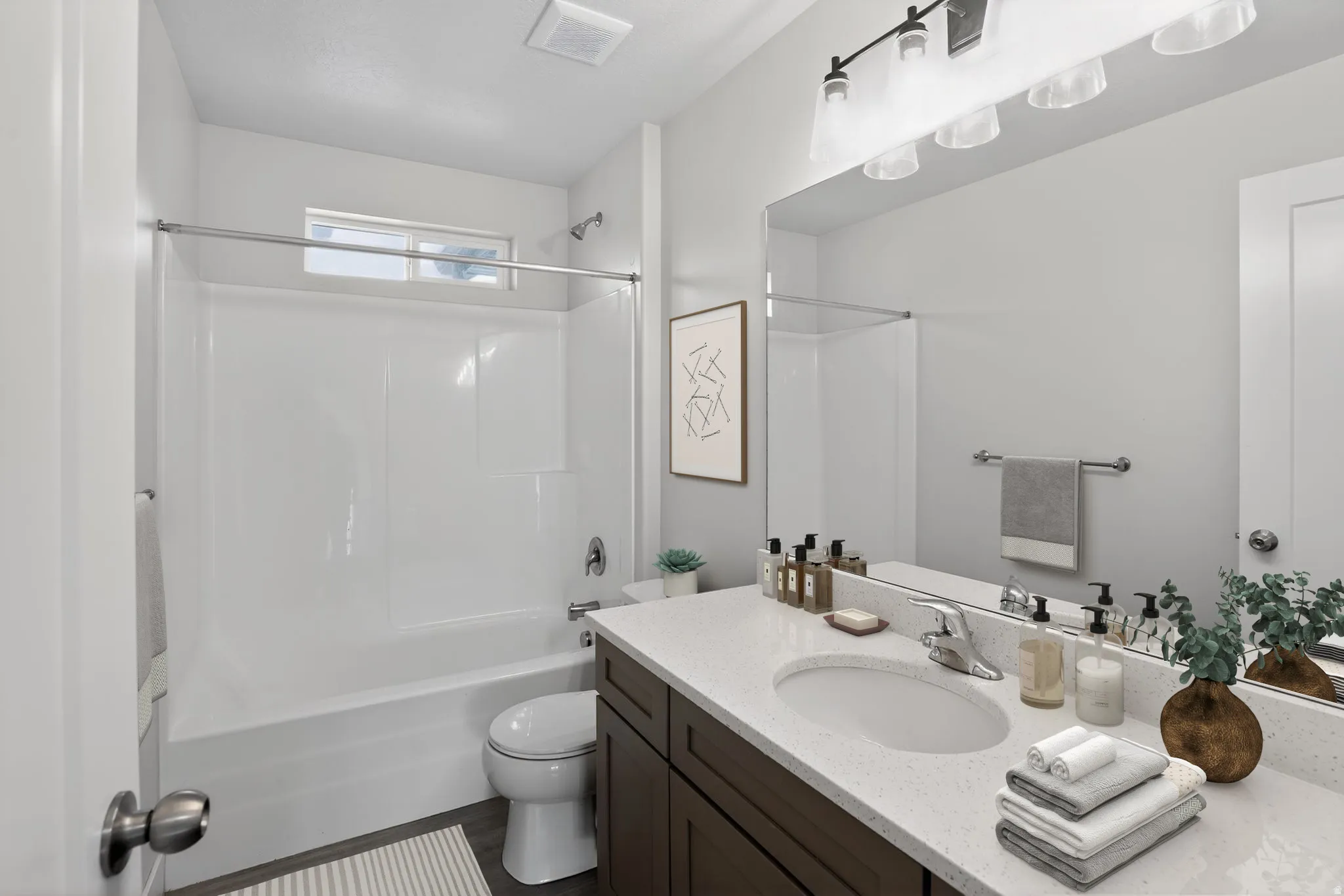 Full bath with vanity and tub / shower combination