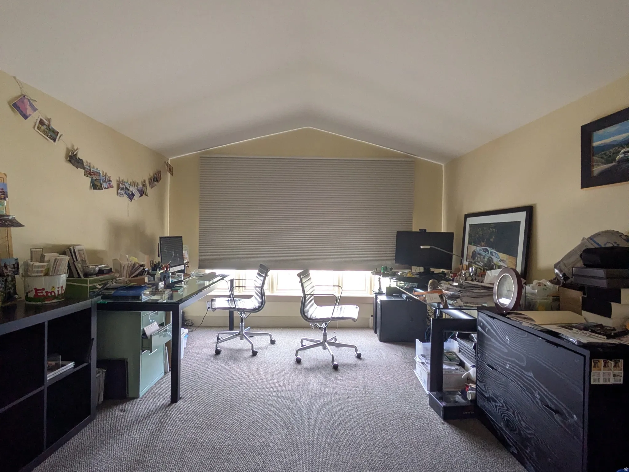 View of carpeted home office or play area