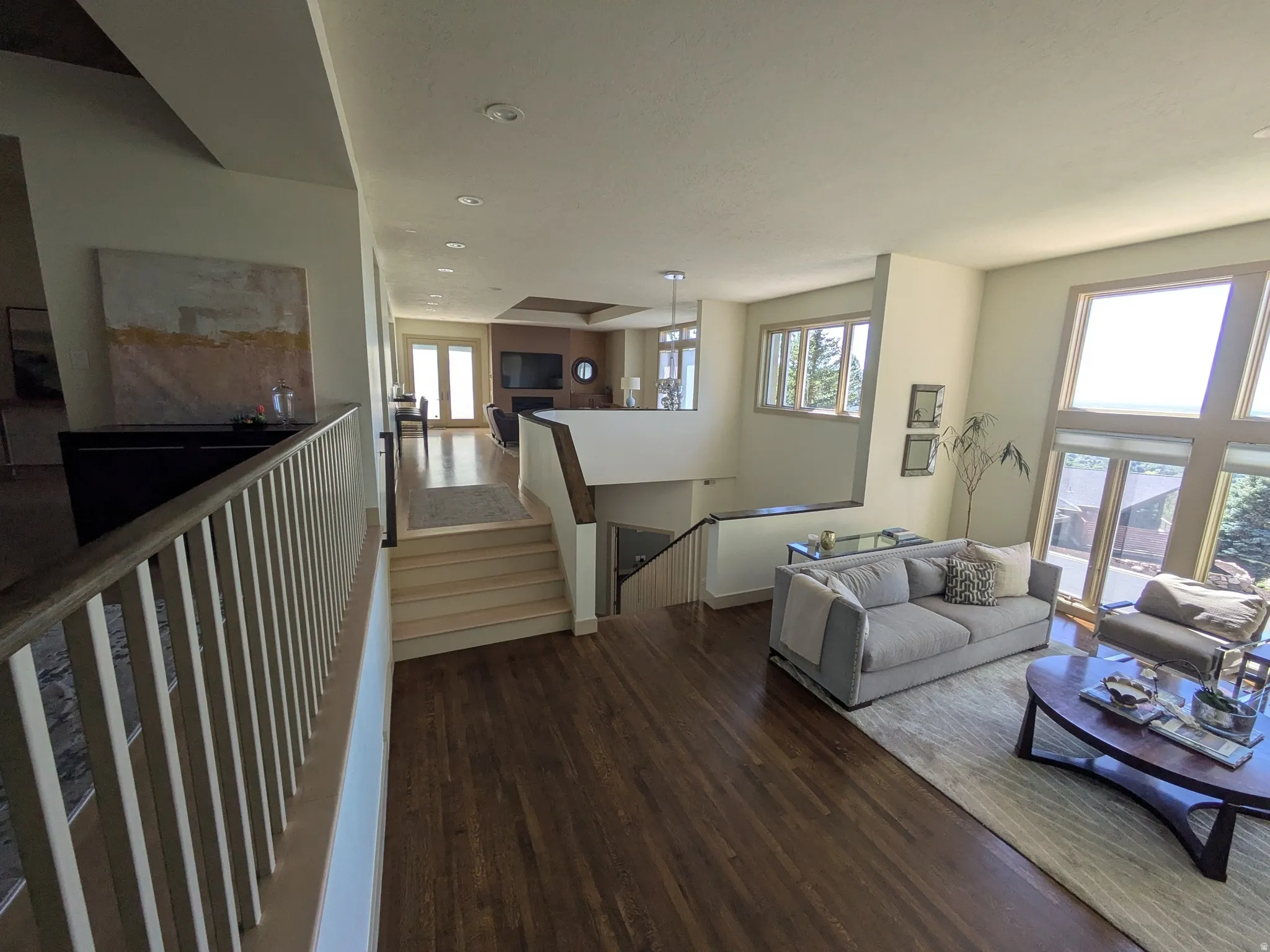 Showing open concept from Living room to family room
