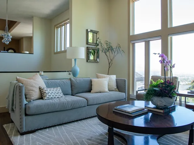 Living area with healthy amount of natural light and wood finished floors
