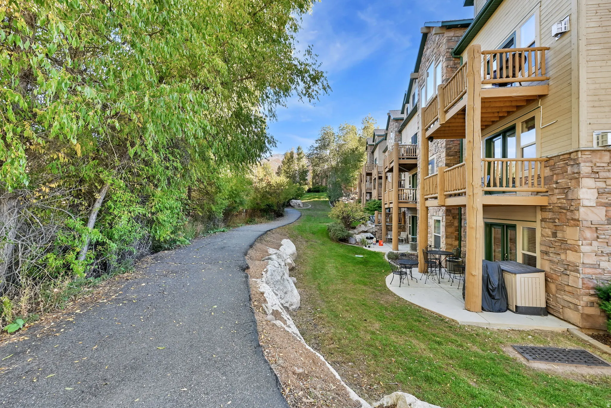 View of home's community featuring a patio area