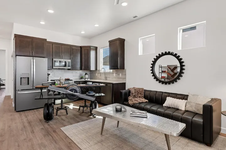 Living area featuring light wood-type flooring and recessed lighting