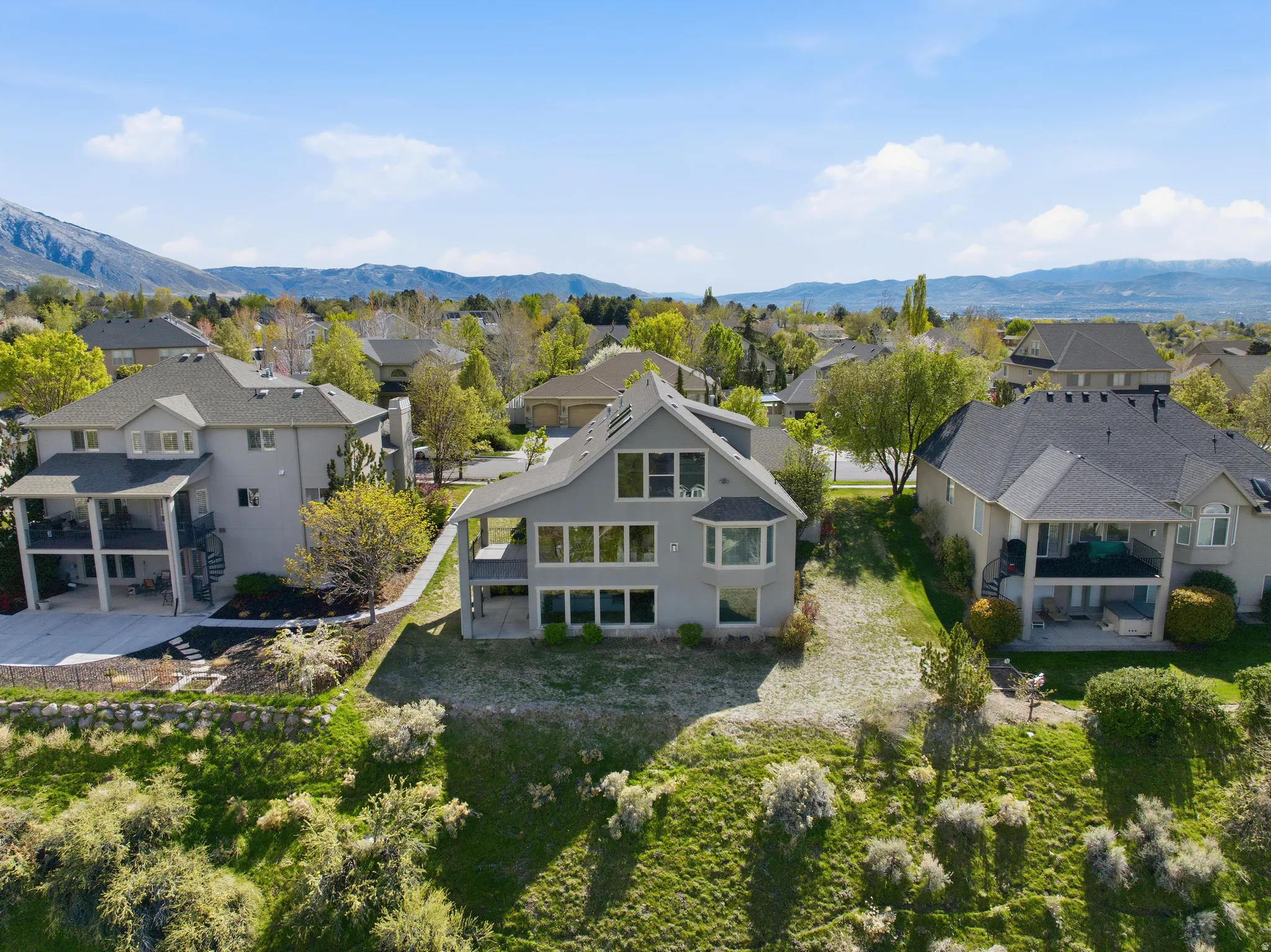 Aerial perspective of suburban area featuring mountains