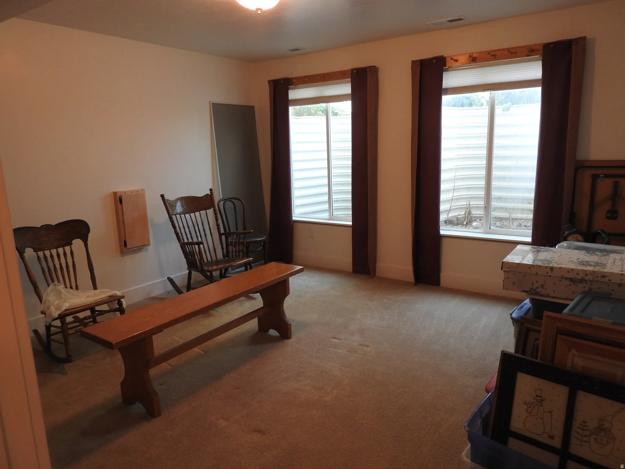 Living area with light carpet