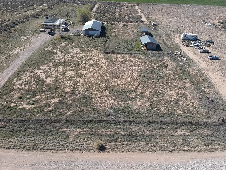 Aerial overview of property's location featuring rural landscape