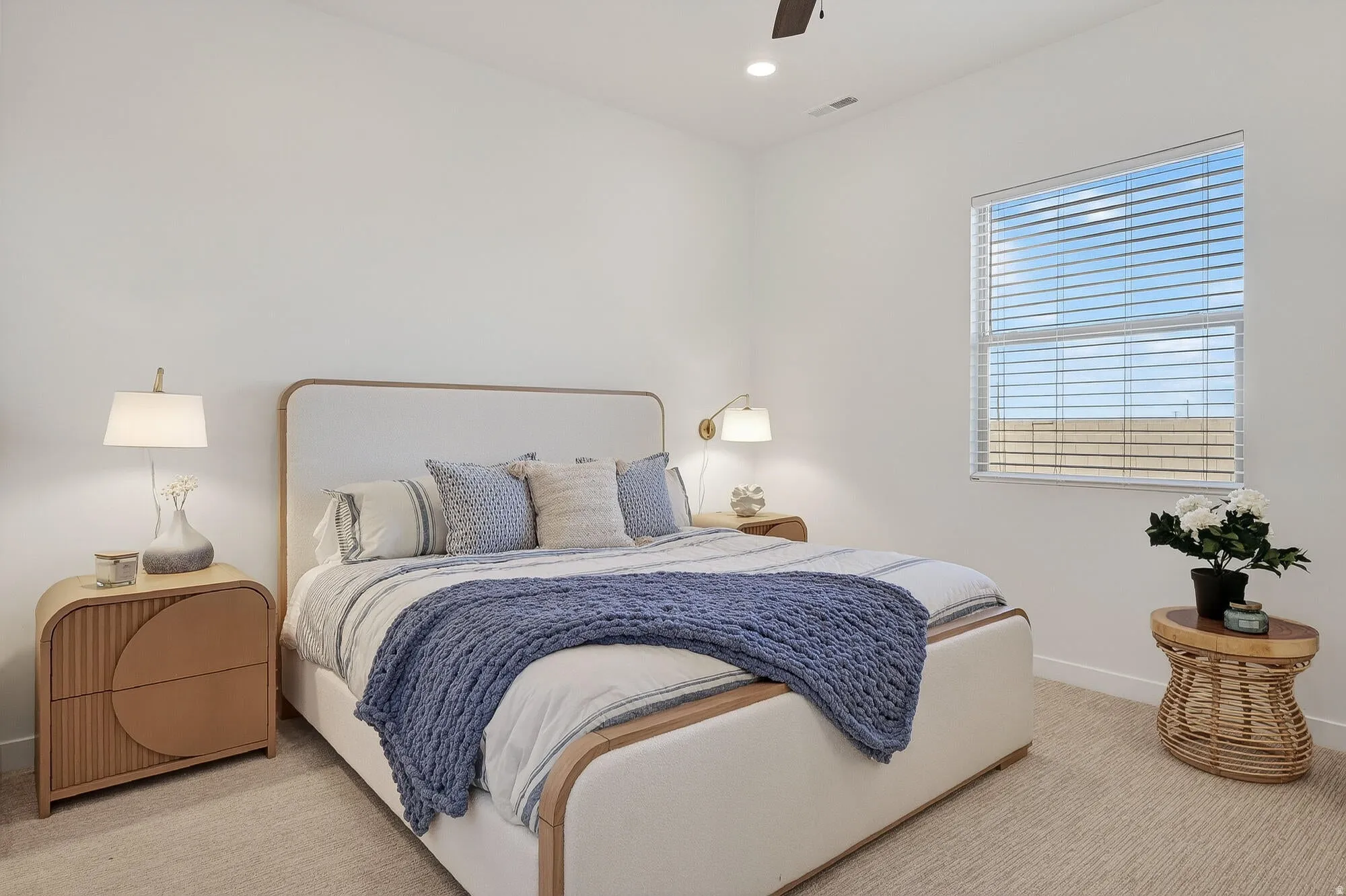 Bedroom featuring a ceiling fan, recessed lighting, and light colored carpet