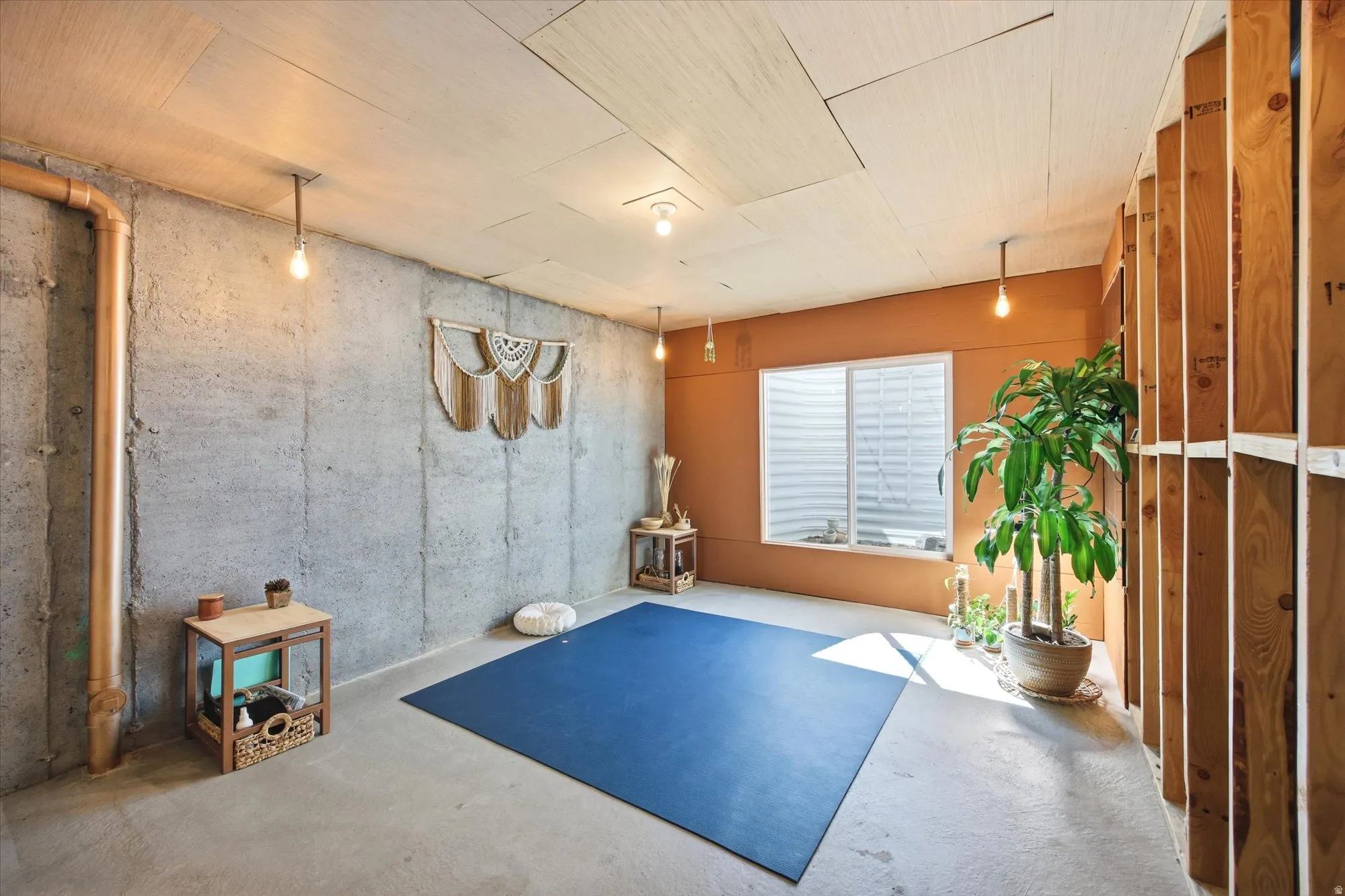 Workout area featuring concrete flooring