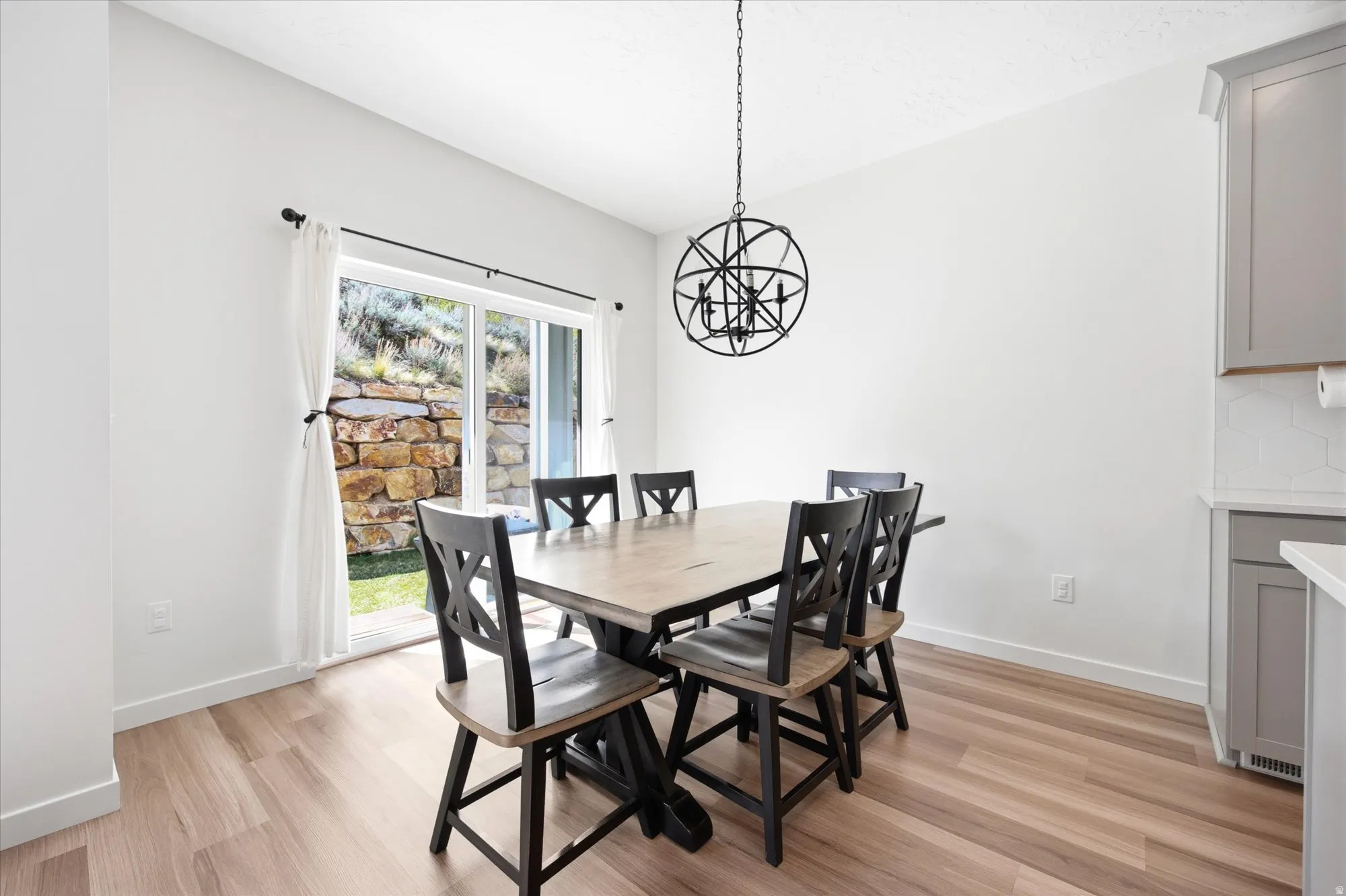 Dining area featuring light wood-style flooring