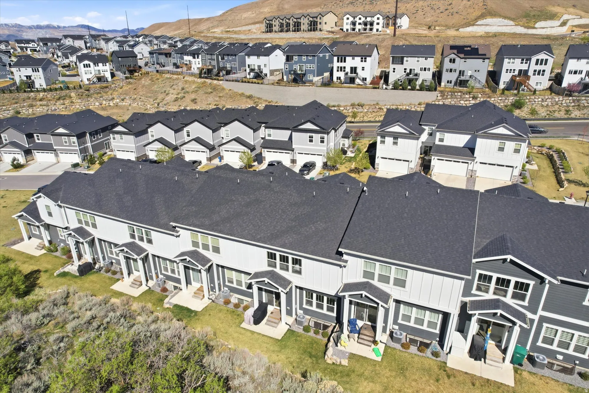 Aerial perspective of suburban area with mountains