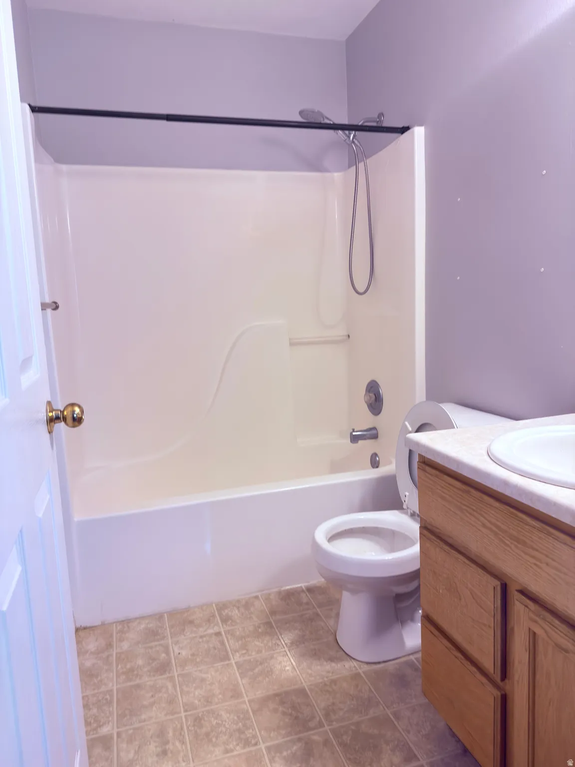 Full bath with vanity and shower / bathtub combination