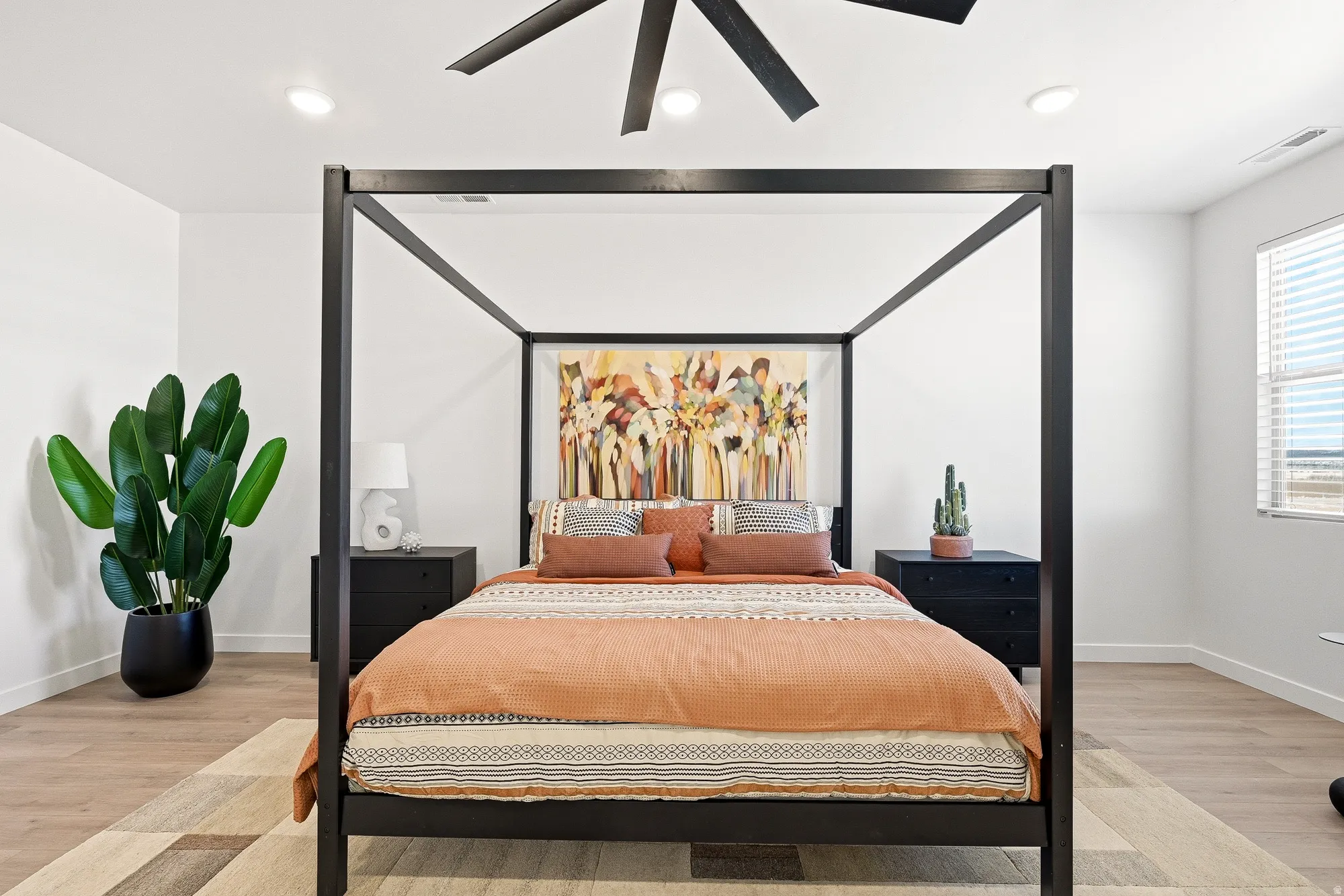 Bedroom featuring light wood finished floors, recessed lighting, and ceiling fan