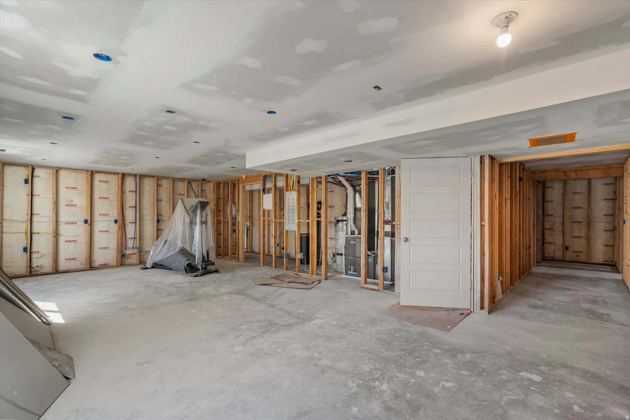 Below grade area featuring heating unit