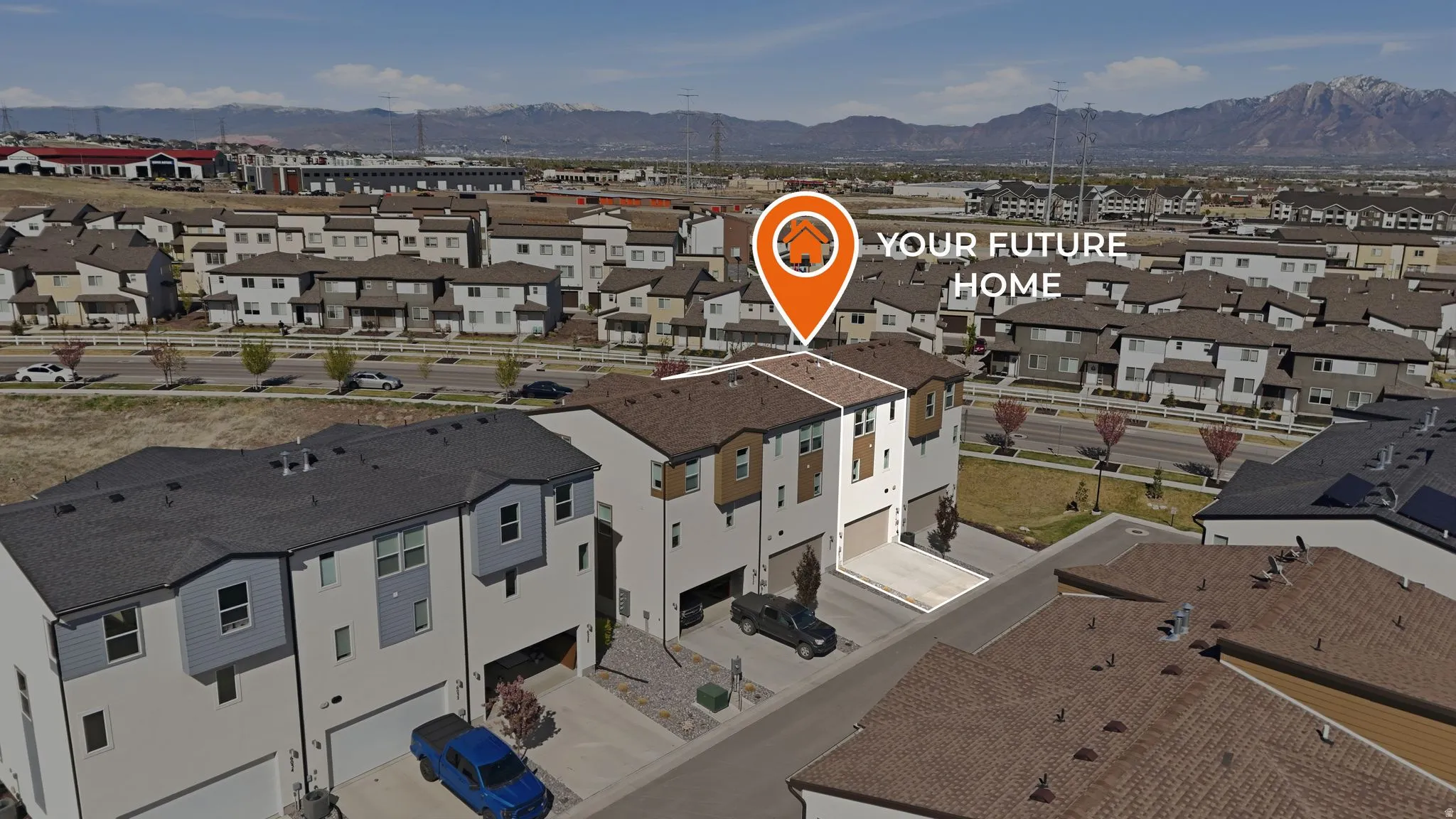 Aerial view of residential area with a mountain backdrop