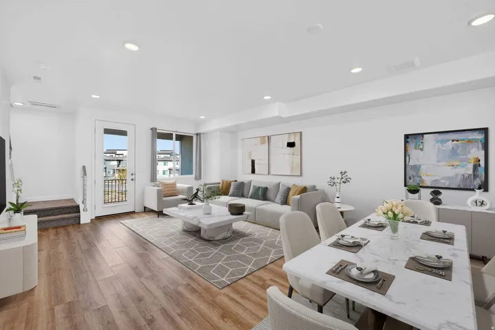 Living area featuring light wood-style floors and recessed lighting