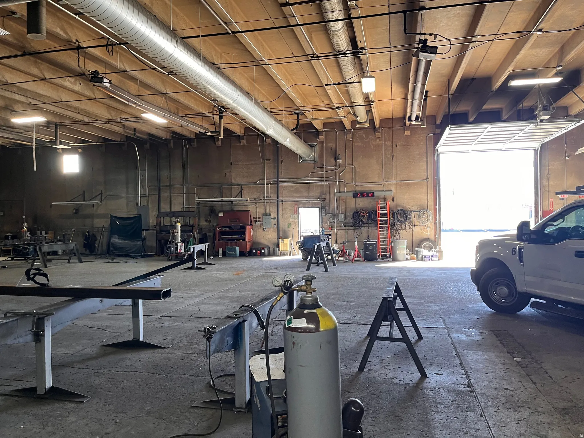 Garage featuring a workshop area