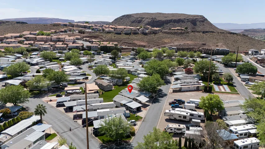 Aerial view of residential area with a mountain backdrop