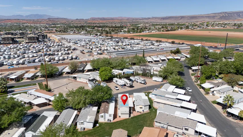 Aerial view of residential area with a mountainous background