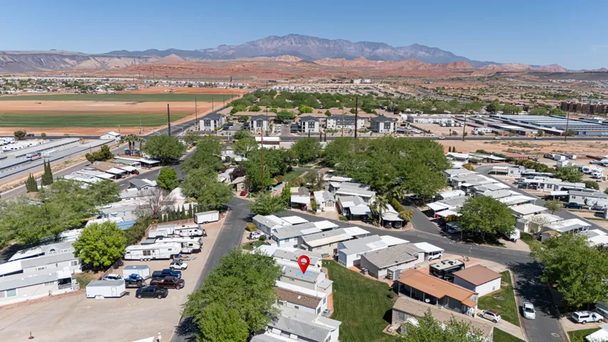 Aerial view of residential area with a mountain backdrop
